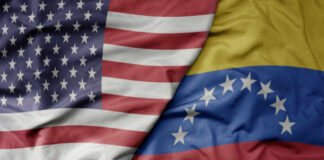 Close-up of the flags of the United States and Venezuela overlapping