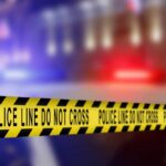 Religious Debate Turns Deadly on Austin Bus Yellow police tape reading 'DO NOT CROSS' at a crime scene