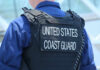 Coast Guard officer in uniform with a visible badge