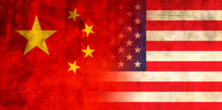 Flags of China and the USA blended together with a textured background