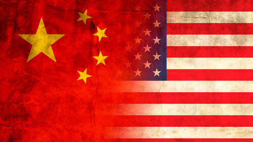 shutterstock_1719752563 (1).jpg Flags of China and the USA blended together with a textured background