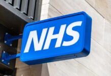 NHS sign displayed prominently on a building