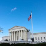 Supreme Court Battle Over Trump’s Citizenship Order U.S. Supreme Court building with American flag and blue sky