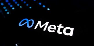 Illuminated Meta logo against a dark background