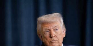 Donald Trump with a serious expression during a media appearance