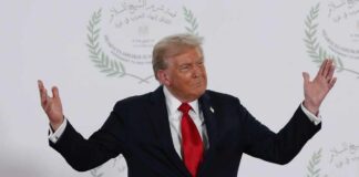 Donald Trump gesturing during a political event