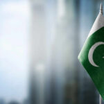 Militants’ Deadly Car Bomb SHOCKS Pakistan Flag of Pakistan waving in a blurred urban background