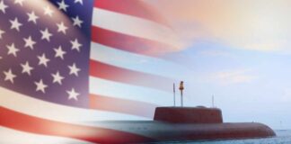 A submarine partially submerged in water with an American flag overlay