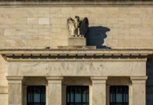 Facade of the Federal Reserve building featuring an eagle sculpture