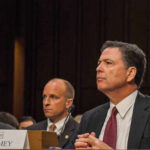 Stunning Dismissal: Prosecutor’s Appointment Was Illegal A man in a suit sitting at a table during a congressional hearing