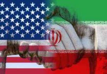 Handshake overlaid with United States and Iran flags