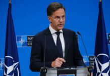 A government official speaking at a NATO press briefing