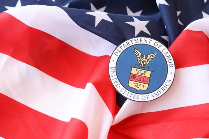 U.S. Department of Labor seal on an American flag