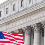Bolton’s Classified Stash Sparks Outrage Facade of a United States courthouse with an American flag in the foreground