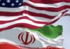Cash to Tehran? Vance Slams Rumors Flags of the United States and Iran waving together