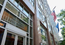Exterior view of the United States Social Security Administration building with flags