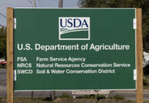 Fertilizer Shock: Washington Rolls Dice Again Sign for the U.S. Department of Agriculture listing various services