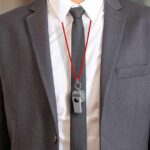 New Blacklist Targets Coaches Nationwide business suit with red lanyard and whistle