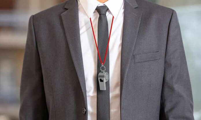 shutterstock_1147129007 business suit with red lanyard and whistle