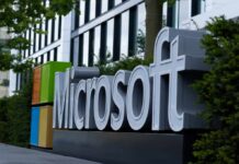 Microsoft’s Cold Reset Sparks Fury Microsoft logo displayed prominently outside a modern office building