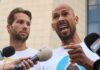 Online Empire Meets Handcuffs in Miami Two men speak into microphones during an outdoor press conference