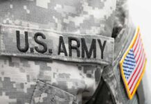 Iran Strike Exposes Base Vulnerability military uniform with embroidered name tape and flag patch