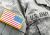 Antichrist Rant Sparks Military Backlash Close-up of a U.S. Army uniform with an American flag patch