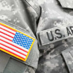 Antichrist Rant Sparks Military Backlash Close-up of a U.S. Army uniform with an American flag patch
