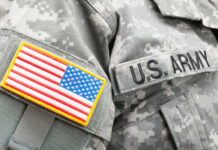 Antichrist Rant Sparks Military Backlash Close-up of a U.S. Army uniform with an American flag patch