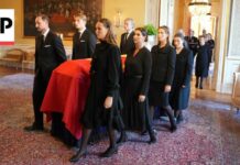 Guarded Procession Freezes Norway Norway royals carry late King Harald V's coffin to chapel