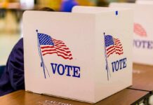 voting booth with American flag graphics