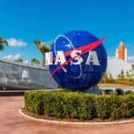 Trump Hands Out NASA’s Rarest Honor NASA globe sign at visitor complex entrance