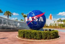Trump Hands Out NASA’s Rarest Honor NASA globe sign at visitor complex entrance