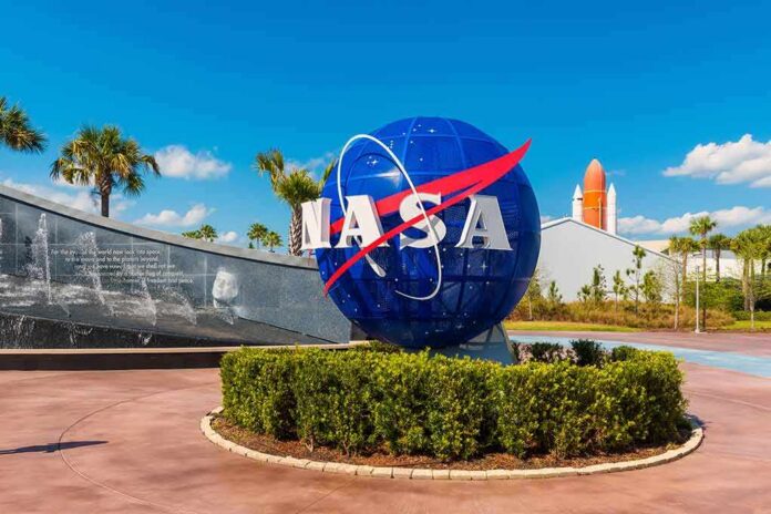 shutterstock_1141345862 NASA globe sign at visitor complex entrance