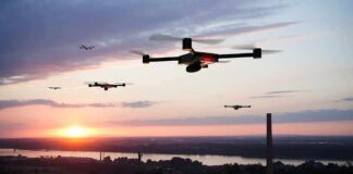 Drones flying over a river landscape at sunset
