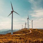 Wind turbines on a sunny hillside