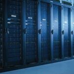Row of server racks in a data center