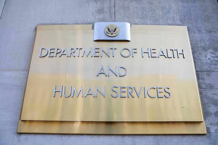 shutterstock_1716116671 Department of Health and Human Services building plaque