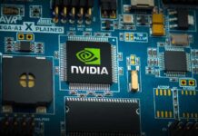 Robot Tax Brawl: Gates Clashes With Nvidia Nvidia chip on a blue circuit board