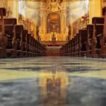 Quran Chant Shocks Catholic Mass Church interior with wooden pews facing ornate altar