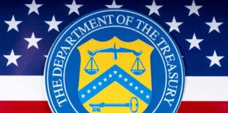 U.S. Department of the Treasury seal over American flag