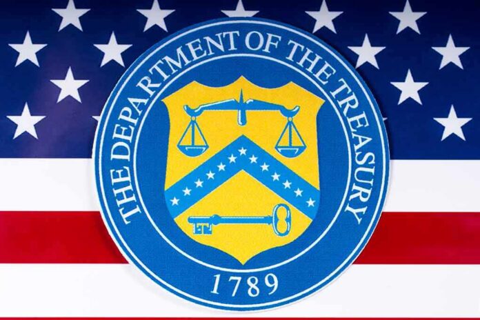 U.S. Department of the Treasury seal over American flag
