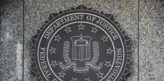 FBI seal mounted on a granite wall