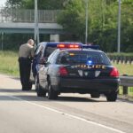 Homicide Charges After Mystery Highway Drift Police officer conducting a traffic stop on a highway