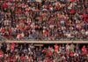 SEC Showdown Halted By Secret Service Peter Keys in a large stadium crowd of football fans