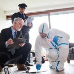 Fox Producer’s Death Sparks Forensic Fight Forensic investigator collects evidence as police and detective observe