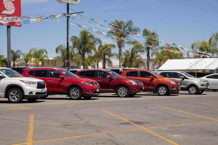 row of SUVs at a car dealership lot