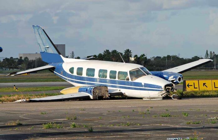 Turboprop,Abandoned,After,Crash,Landing Damaged blue and white small airplane on an airport runway