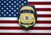 ICE officer badge on American flag background