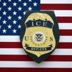 ICE officer badge on American flag background